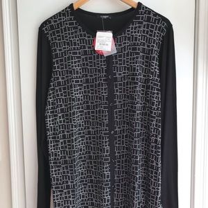 Black Top with Silver/White details, and buttons.